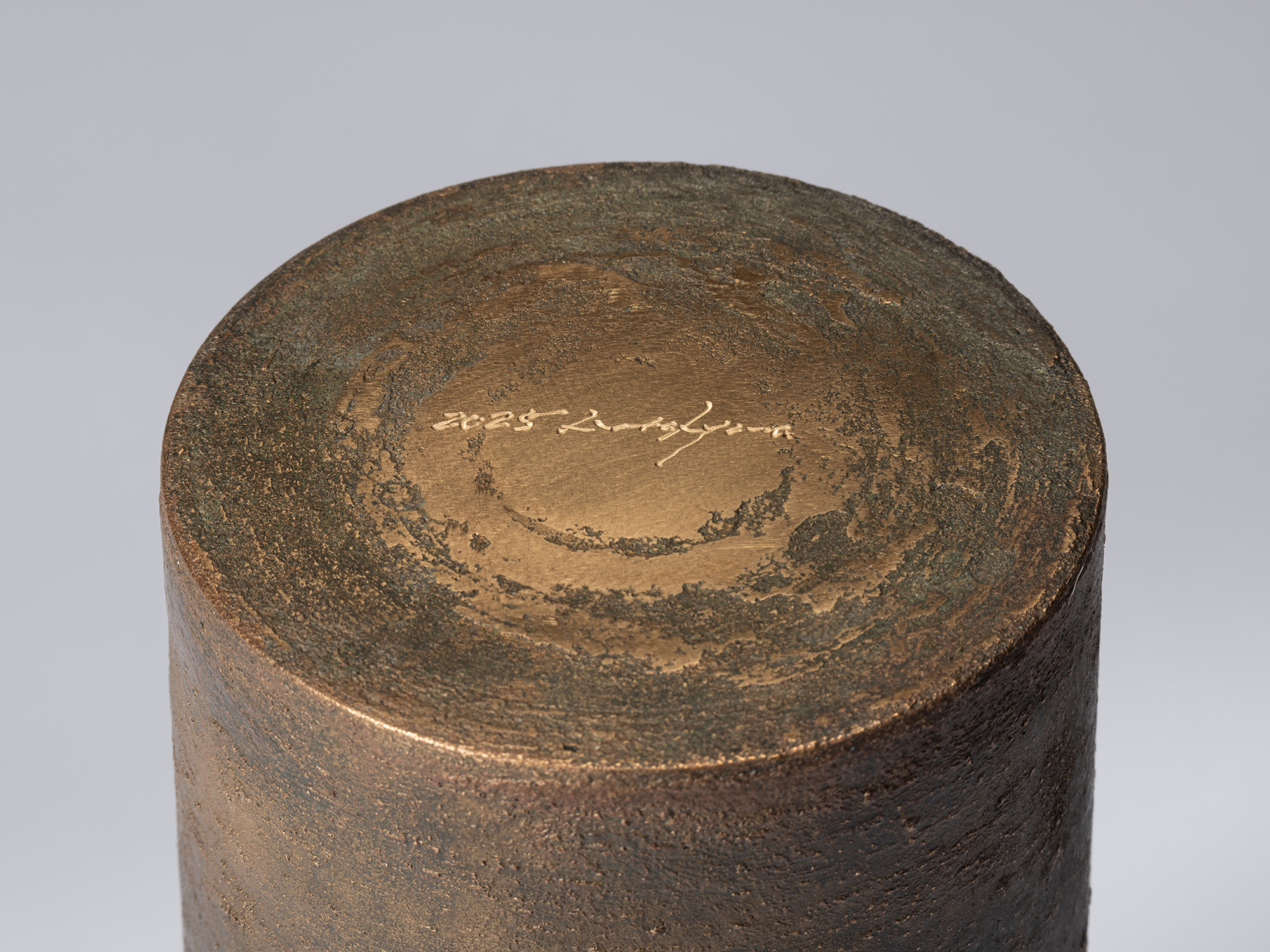 Close-up of the underside of Bronze as Bronze II No. 28, showing a mottled bronze surface with...