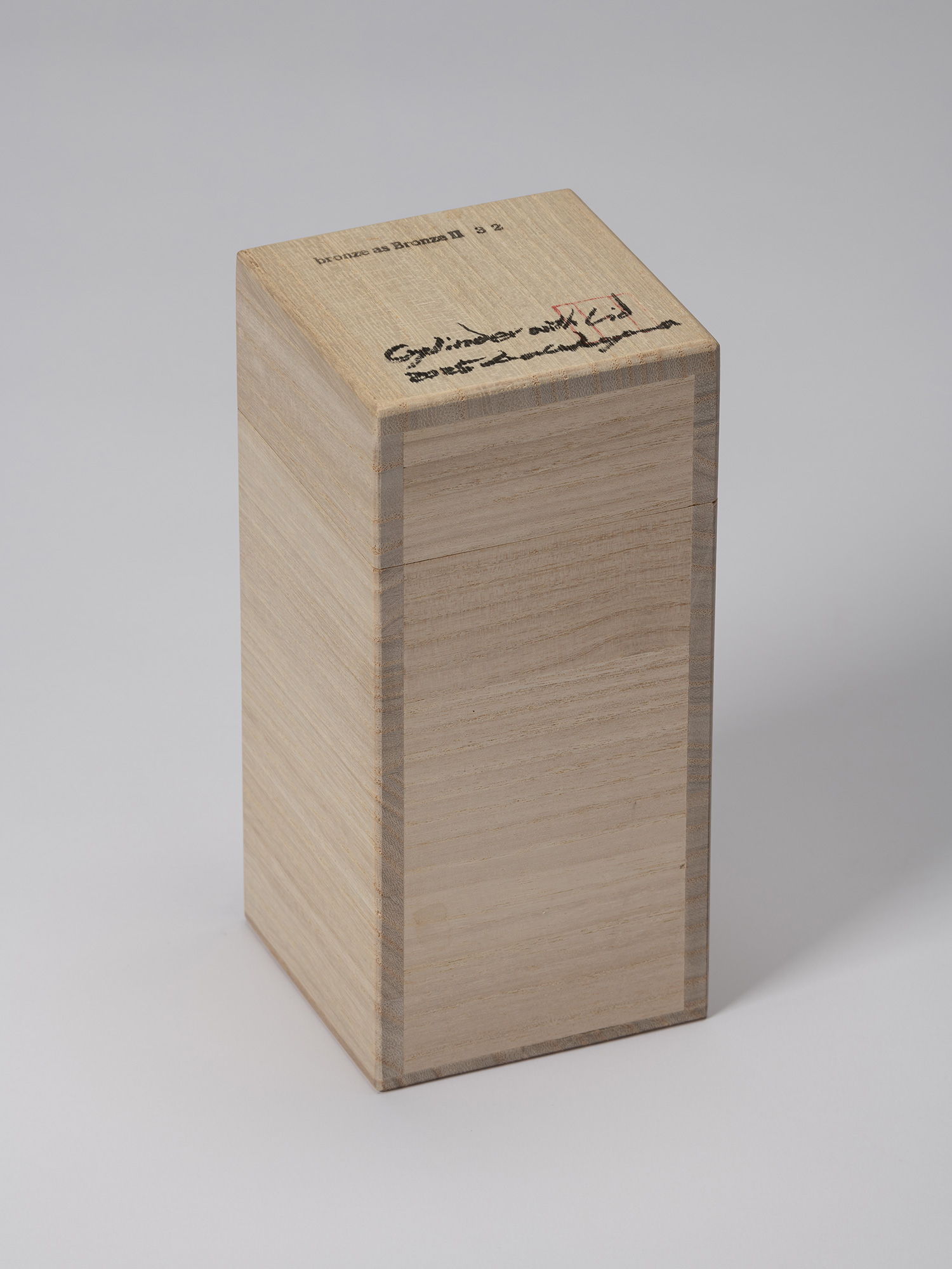 Closed wooden storage box for bronze as Bronze II No. 32, with the title, handwritten inscriptions,...